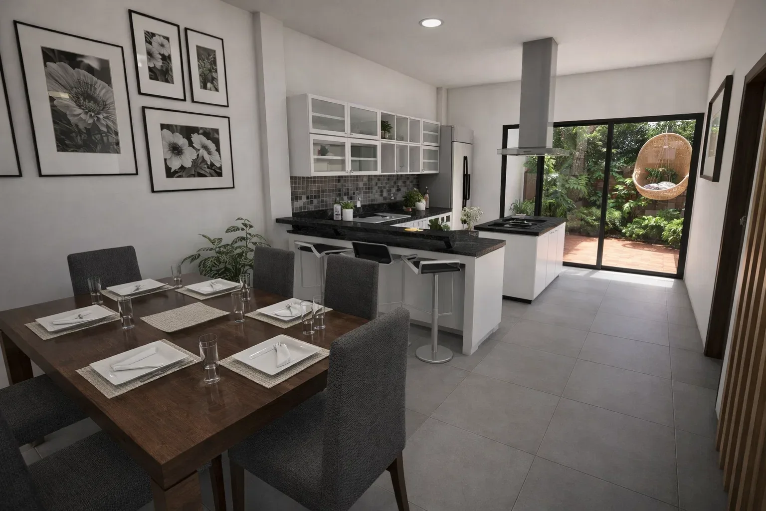 Comedor y cocina con barra abierta, con salida al patio posterior a través de un ventanal corredizo